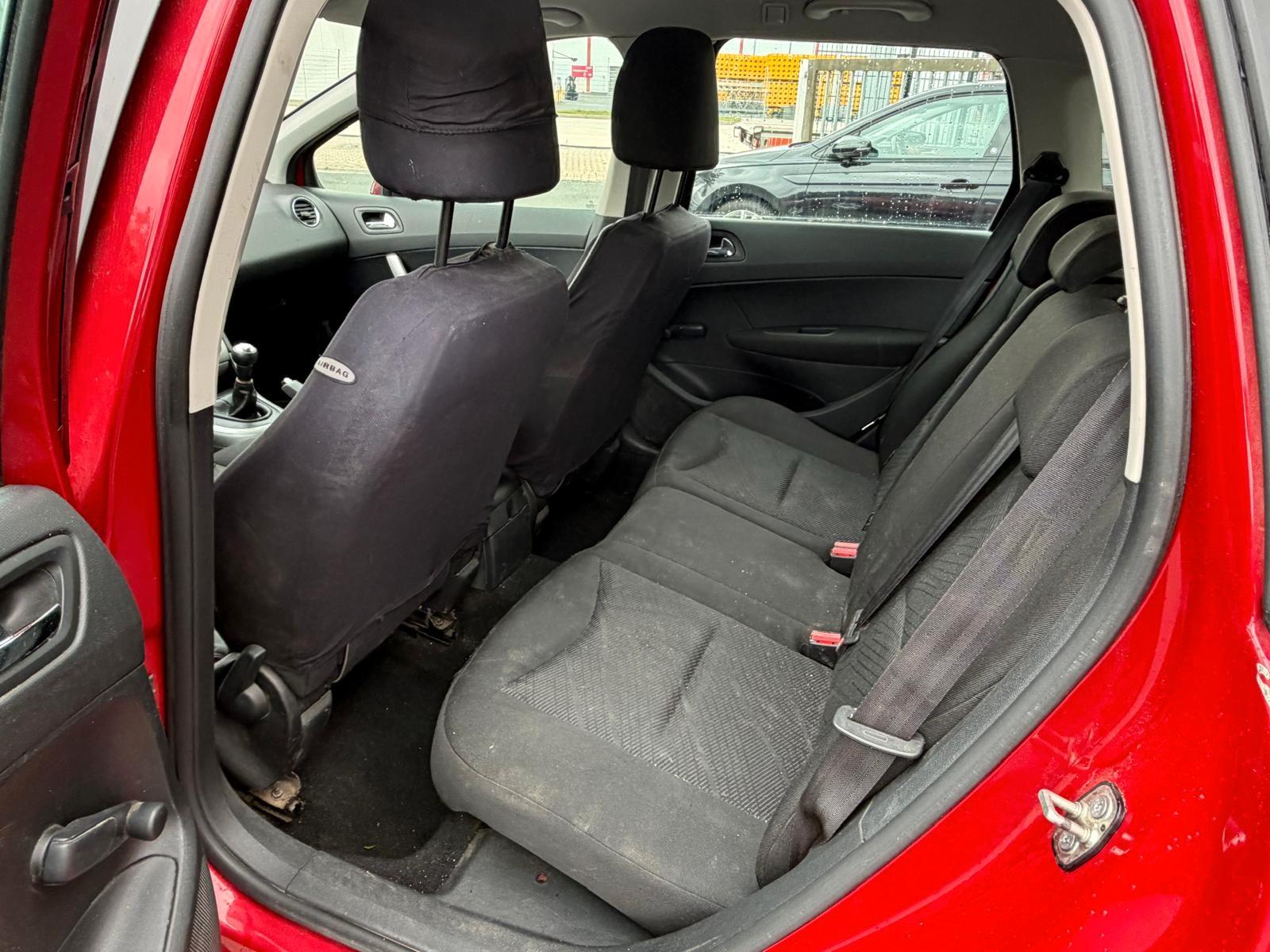 Peugeot 308 2012 — photo 18