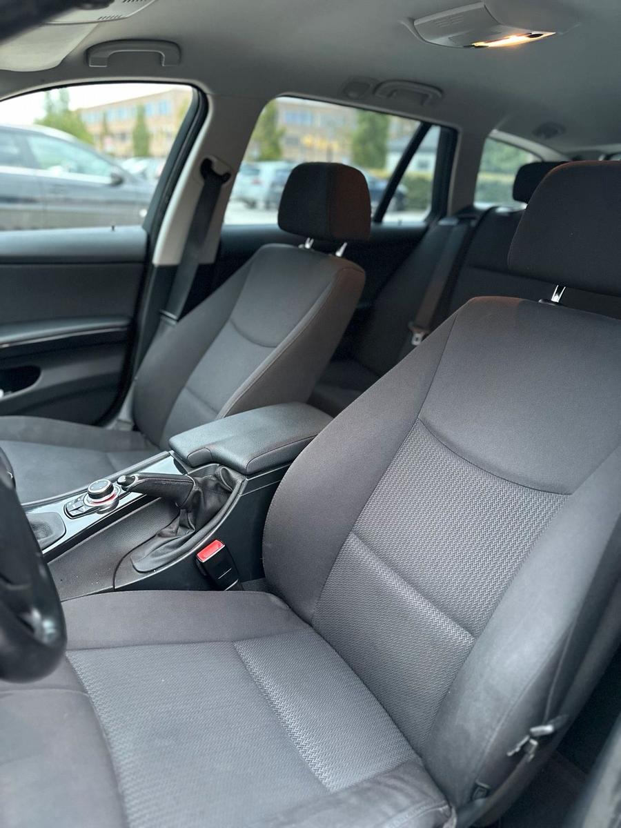 BMW 318 2009 — photo 11