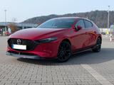 Mazda 3 e-SKYACTIV X 186 Exclusive-L, OEM Sport-Kit - gebrauchte Mazda 3 aus dem Jahr 2023