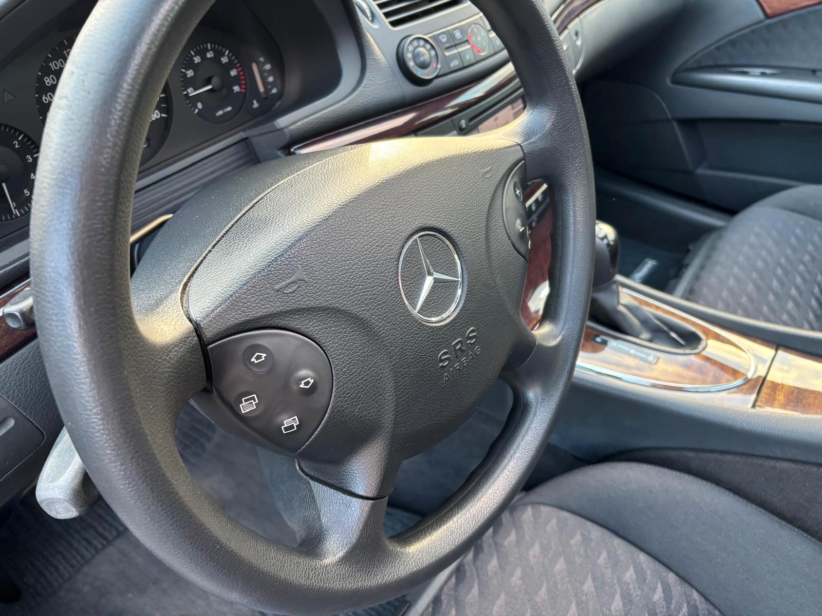 Mercedes-Benz E200 2004 — photo 20