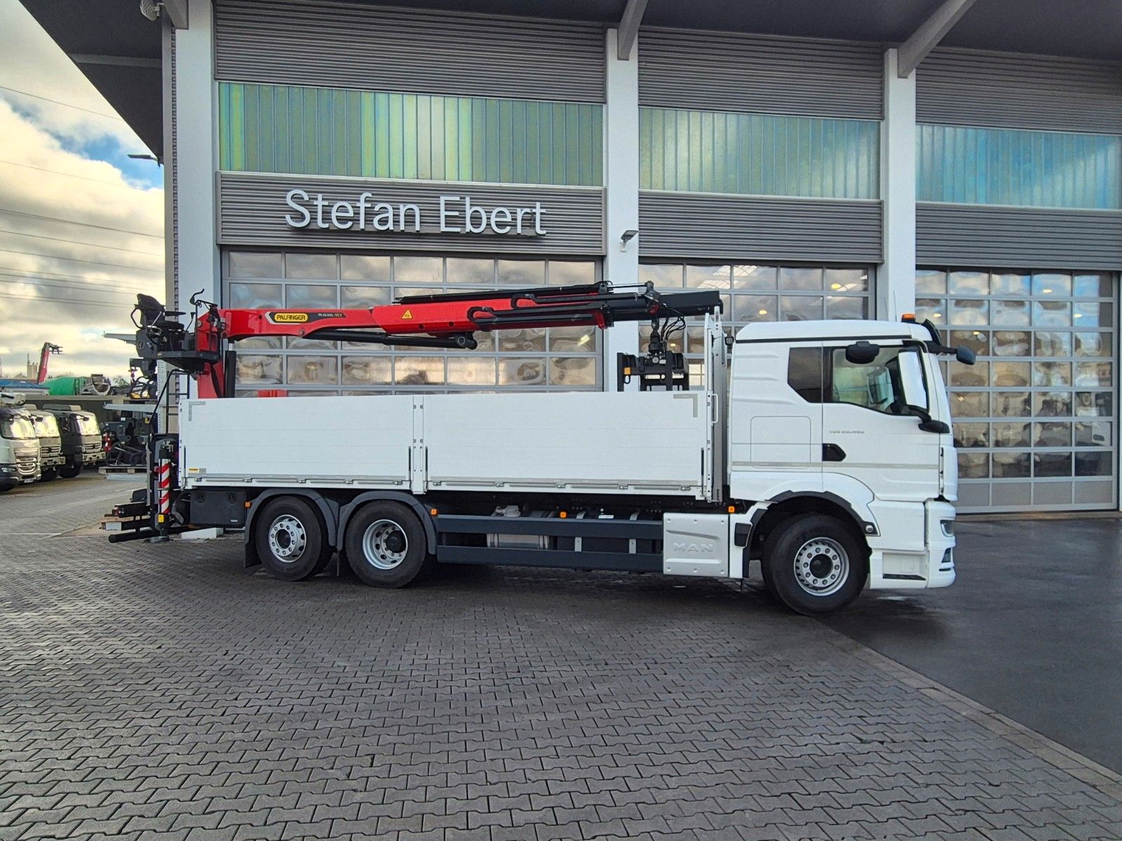 Fahrzeugabbildung MAN TGS 26.470 6x2-4 LL Baustoff Palfinger PK20.501L