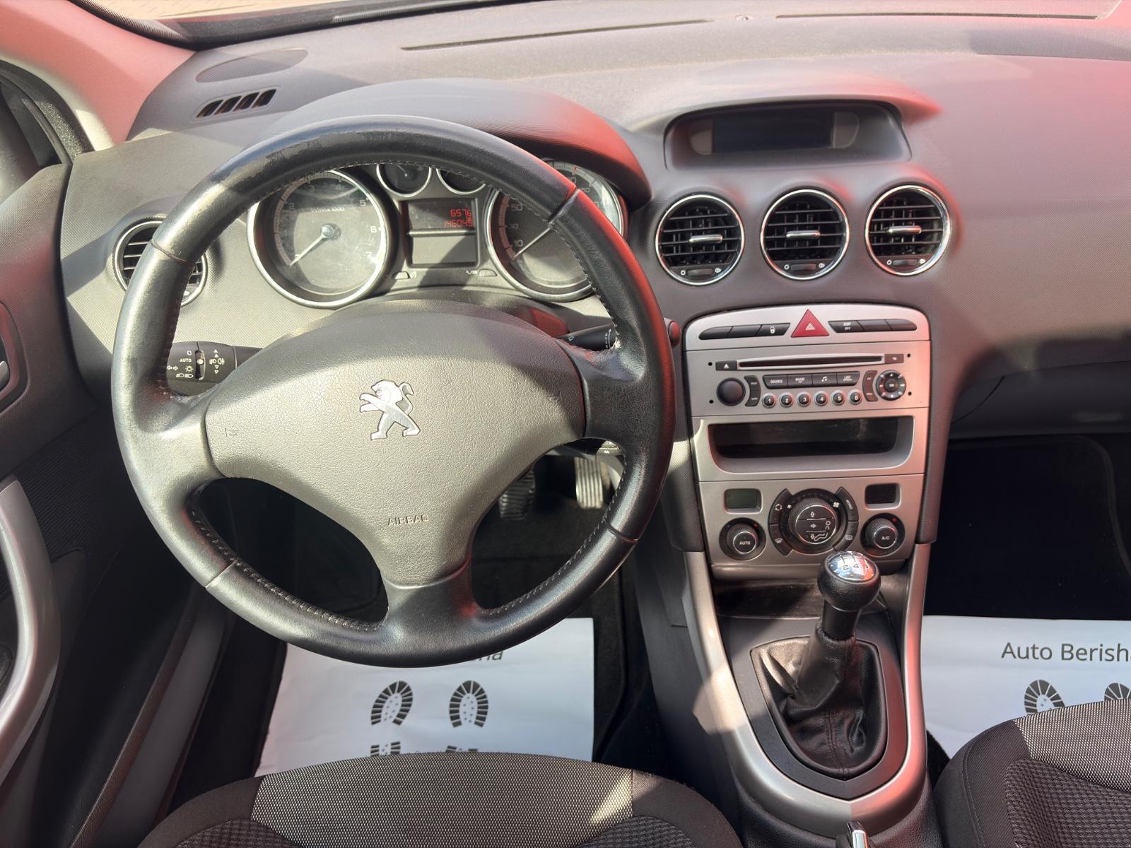 Peugeot 308 2012 — photo 22