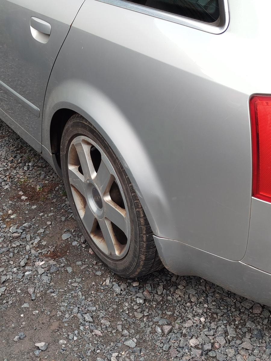 Audi A4 2004 — photo 11