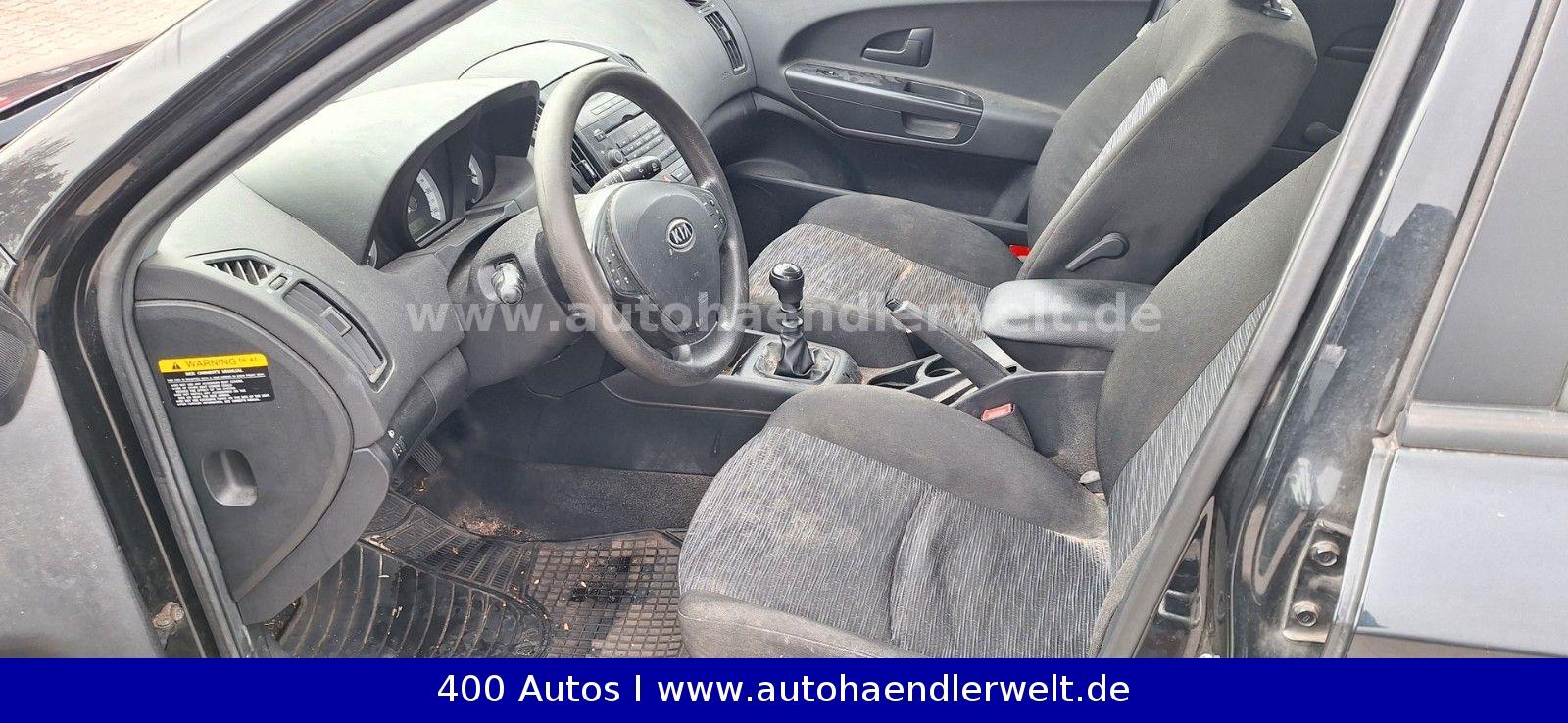 Kia cee'd 2009 — photo 11