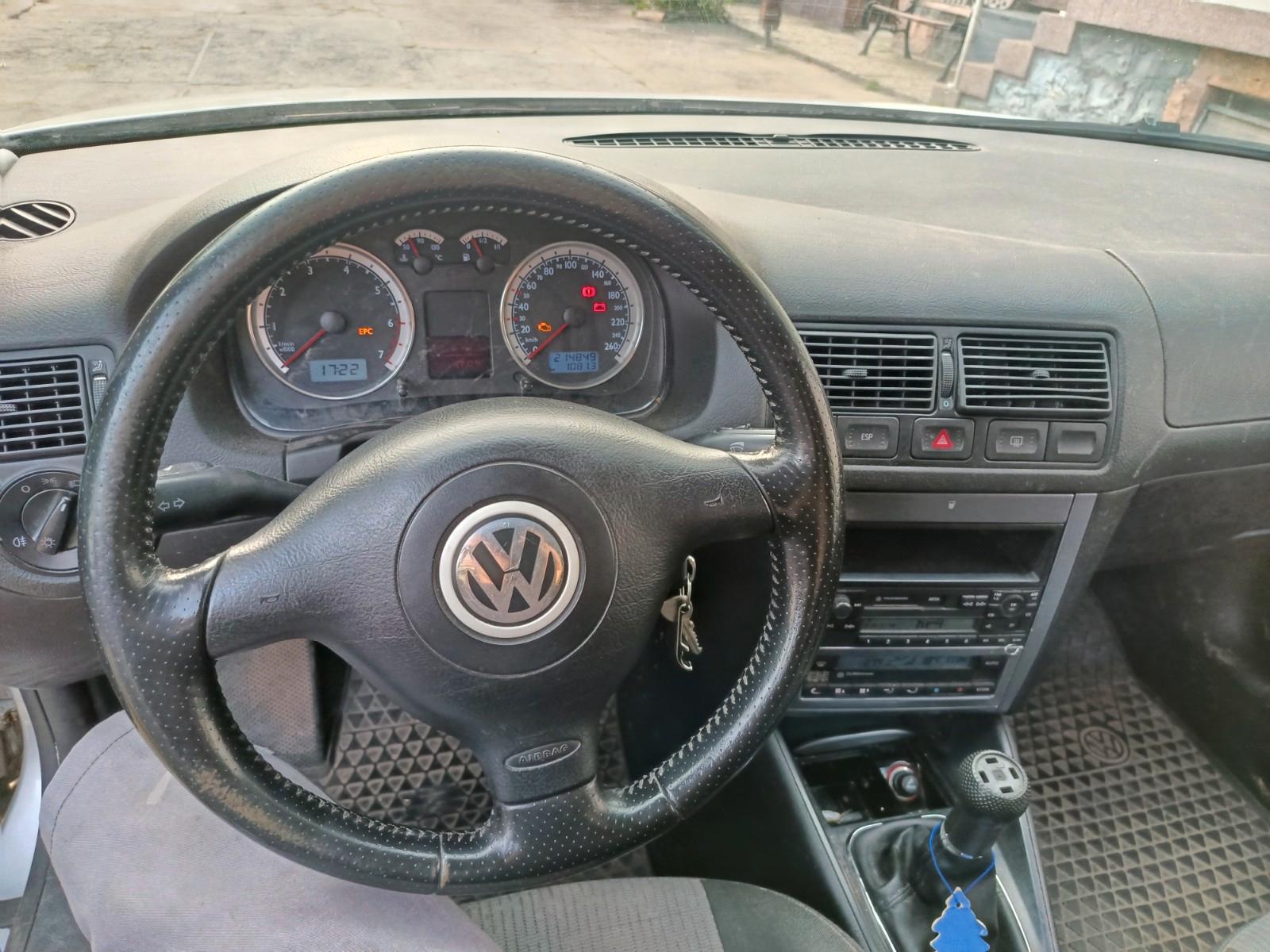 Volkswagen Golf 2004 — двигун 1.390 cm³, 75 HP (55kW)