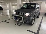 Suzuki Jimny 1.3 Cabrio 4WD Camouflage - Suzuki Jimny Gebrauchtwagen in Hamburg