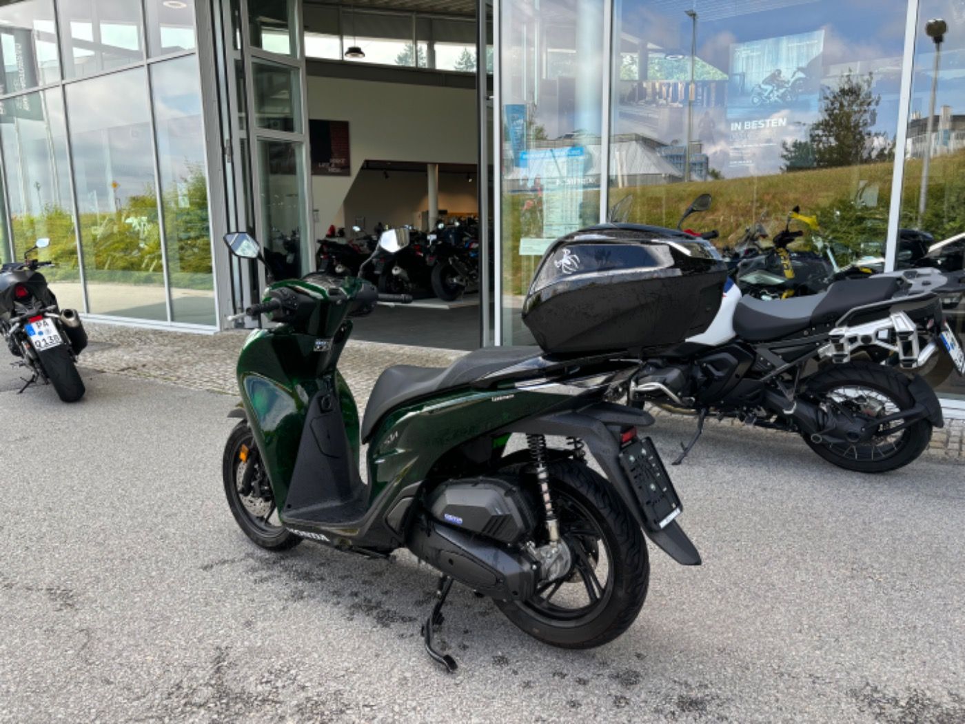 Fahrzeugabbildung Honda SH 150i inkl. Topcase, Garantie
