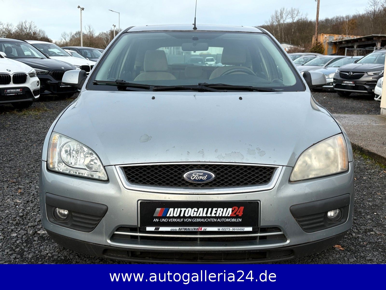 Fahrzeugabbildung Ford Focus 1.6 Lim. Ghia Klimaauto Glasdach SHZ PDC
