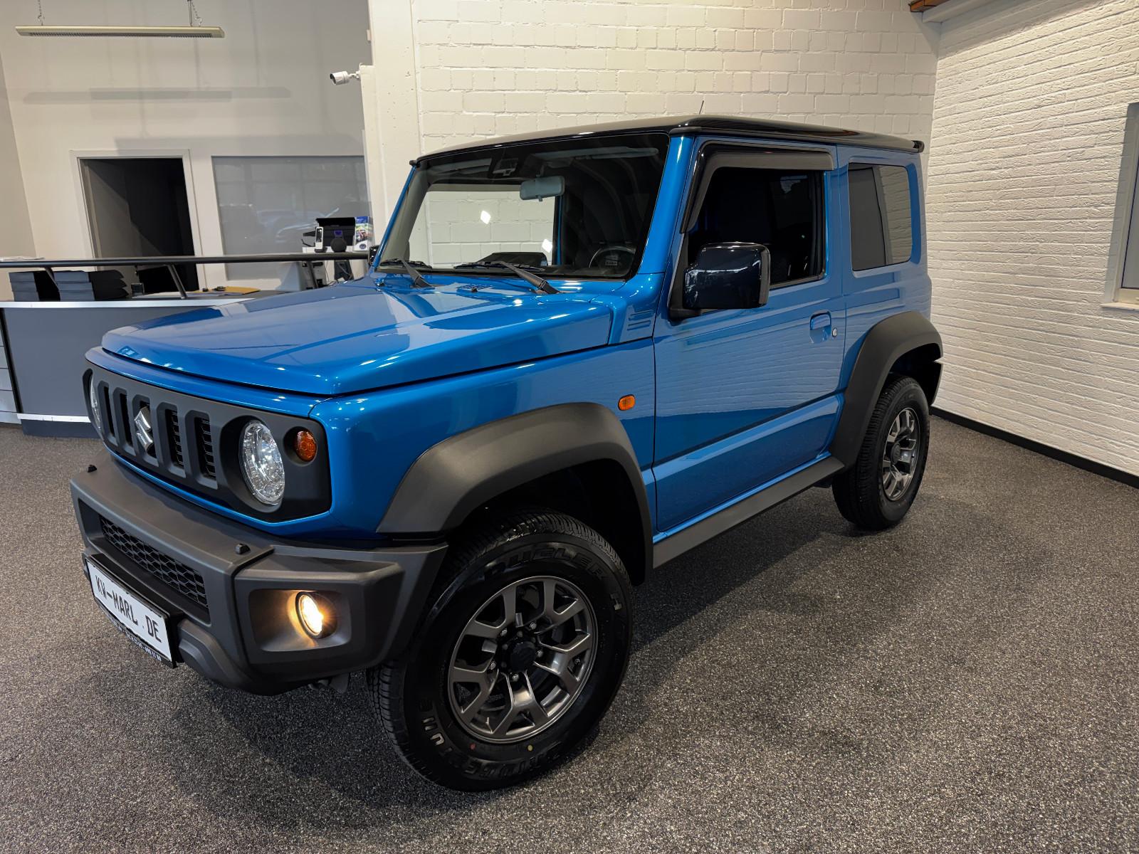 Suzuki Jimny Comfort+ AllGrip NAVI+CAM KLIMAAUTO SITZH.