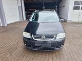 Volkswagen Touran Highline - Volkswagen Touran aus 2006: Highline