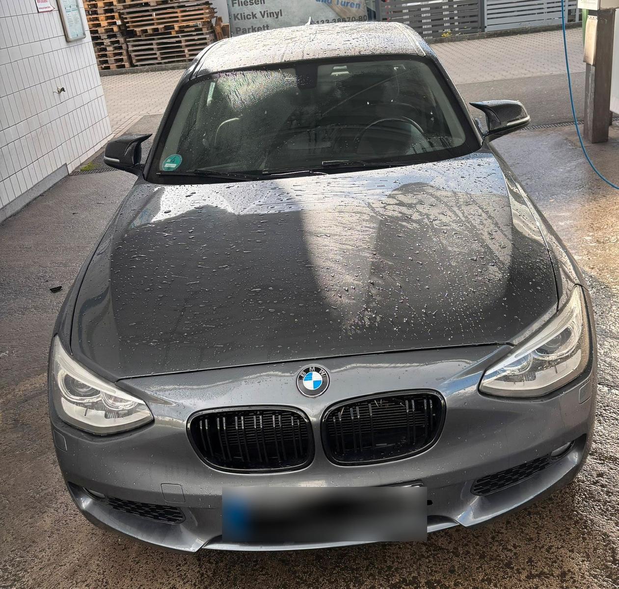BMW 118 2014 — вигляд ззаду