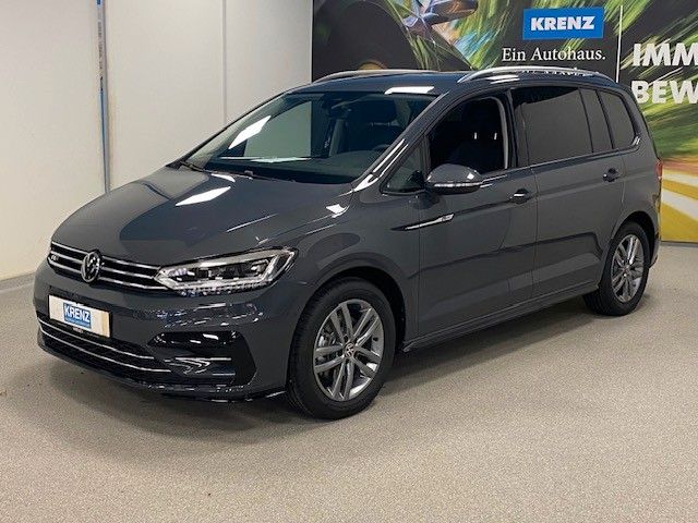 Volkswagen Touran 1.5 TSI DSG R-Line+CL+7 SITZE+NAVI+AHK+BC