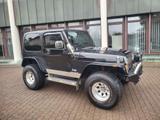 Jeep Wrangler 4.0 Sport HÖHER-BREITER-SUPER OPTIK-AHK - Jeep Wrangler Gebrauchtwagen