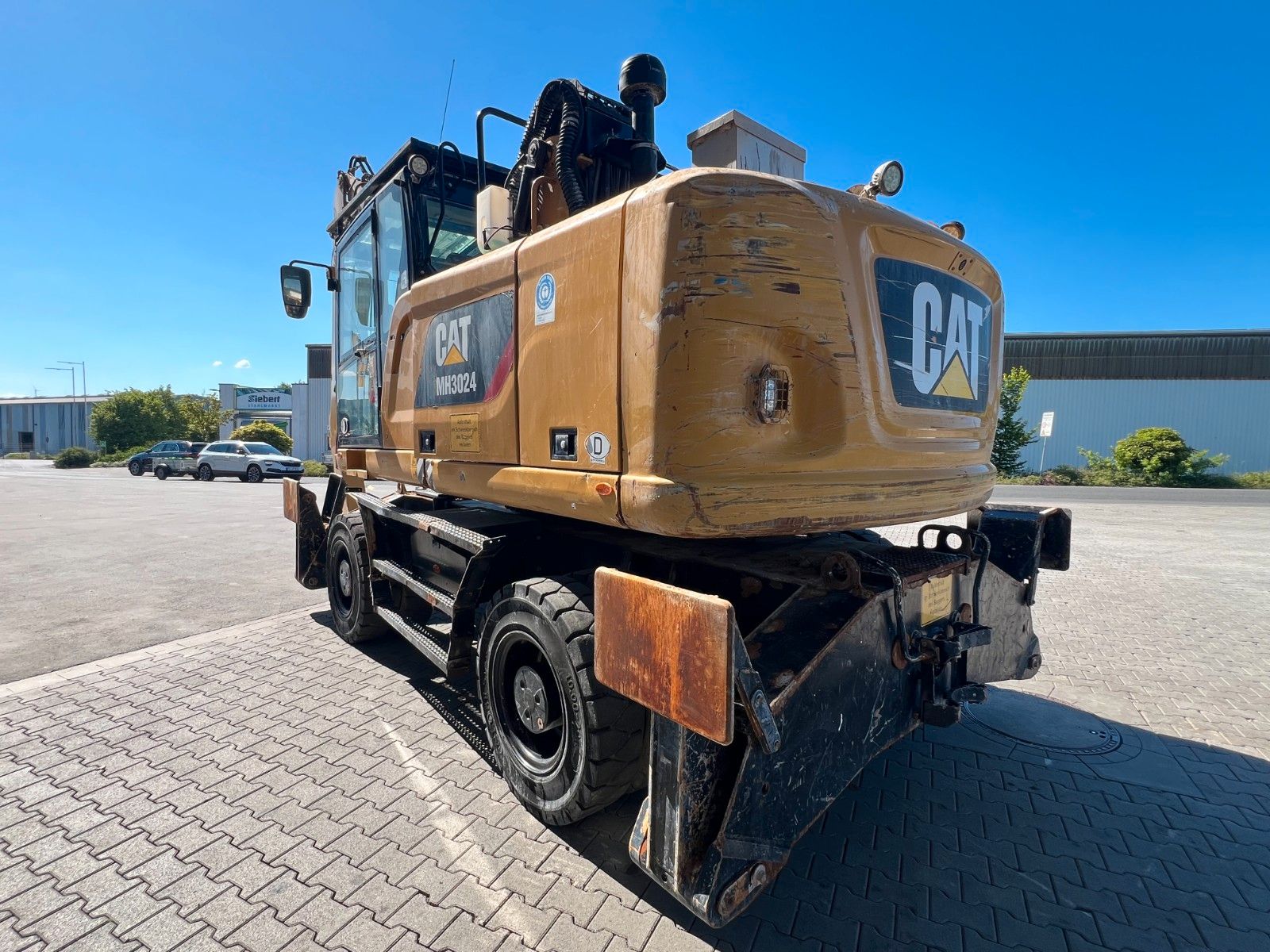 Fahrzeugabbildung CAT MH3024 / Schrottgreifer / 2019 / 9.082h