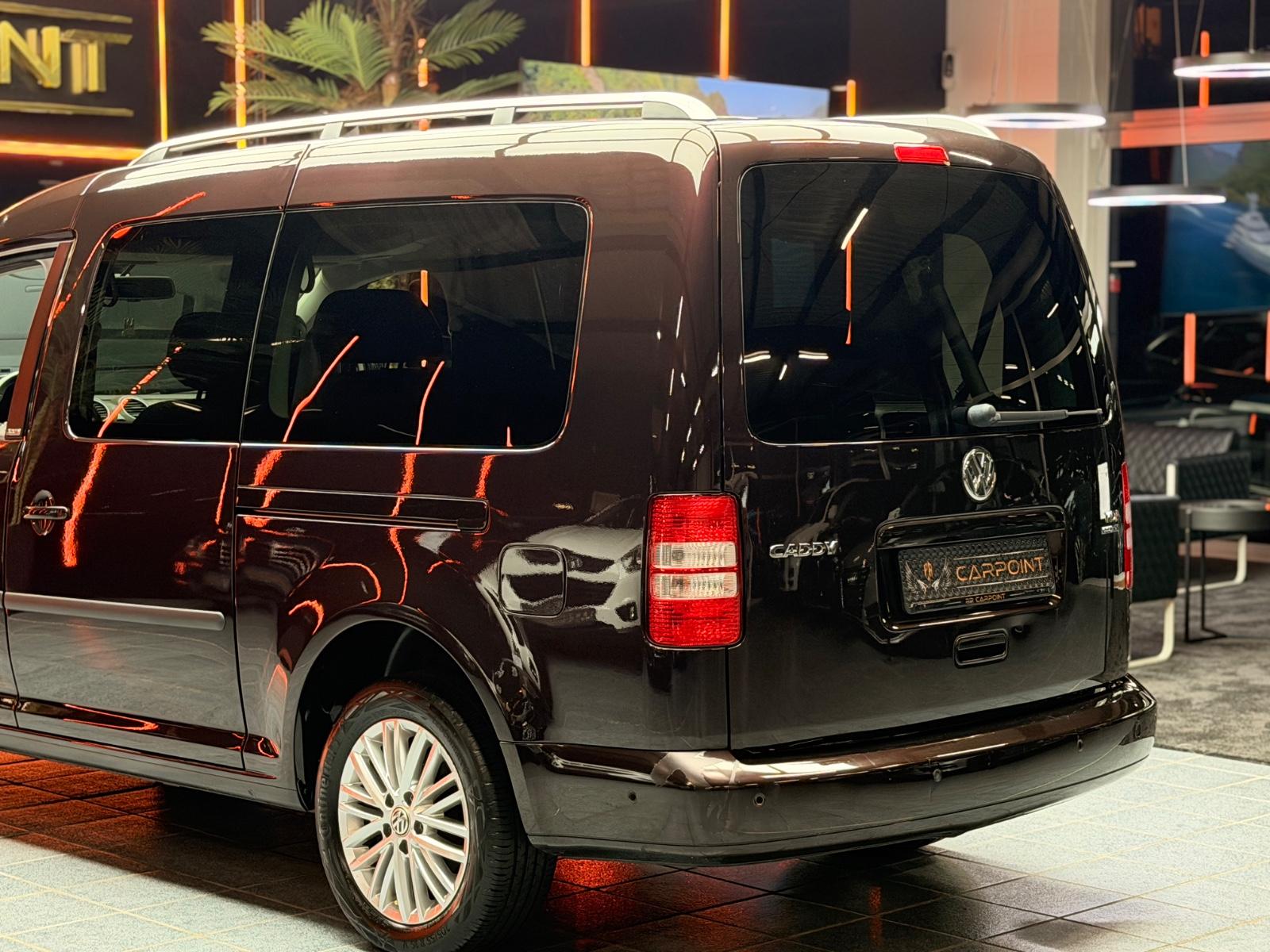Volkswagen Caddy Maxi Kombi / Navi /7-Sitzer/Rollstuhl-Kran