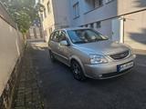 Kia Carens 2.0 Zahnriemen und Wasserpumpe gewechselt - gebrauchte Kia Carens aus dem Jahr 2005