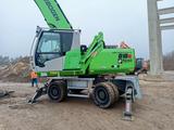 Sennebogen 818E  Umschlagbagger mit Sortiergreifer