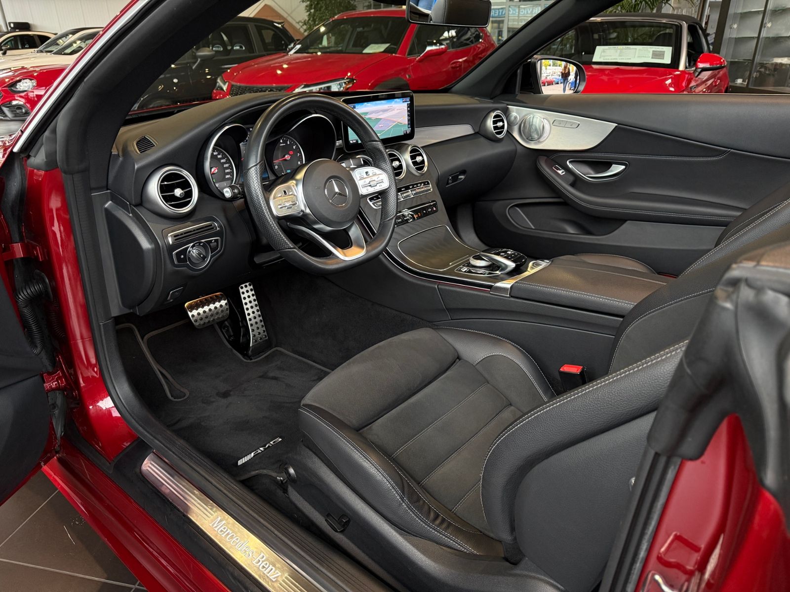 Fahrzeugabbildung Mercedes-Benz C 200 Cabrio AMG NIGHT Navi Rückfahr KAM Sounds.