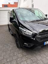 Ford Tourneo Custom mit Motorradtransportsystem - gebrauchte Ford Tourneo Custom aus dem Jahr 2023