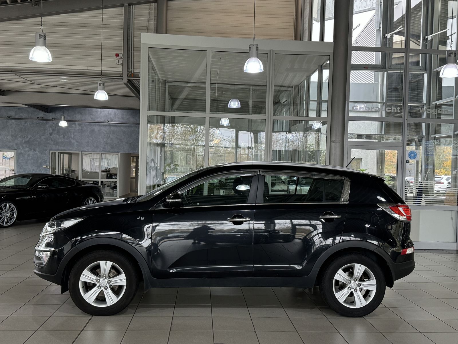 Fahrzeugabbildung Kia Sportage 1.7 CRDi 2WDKamera AHK PDC Sitzhzg Navi