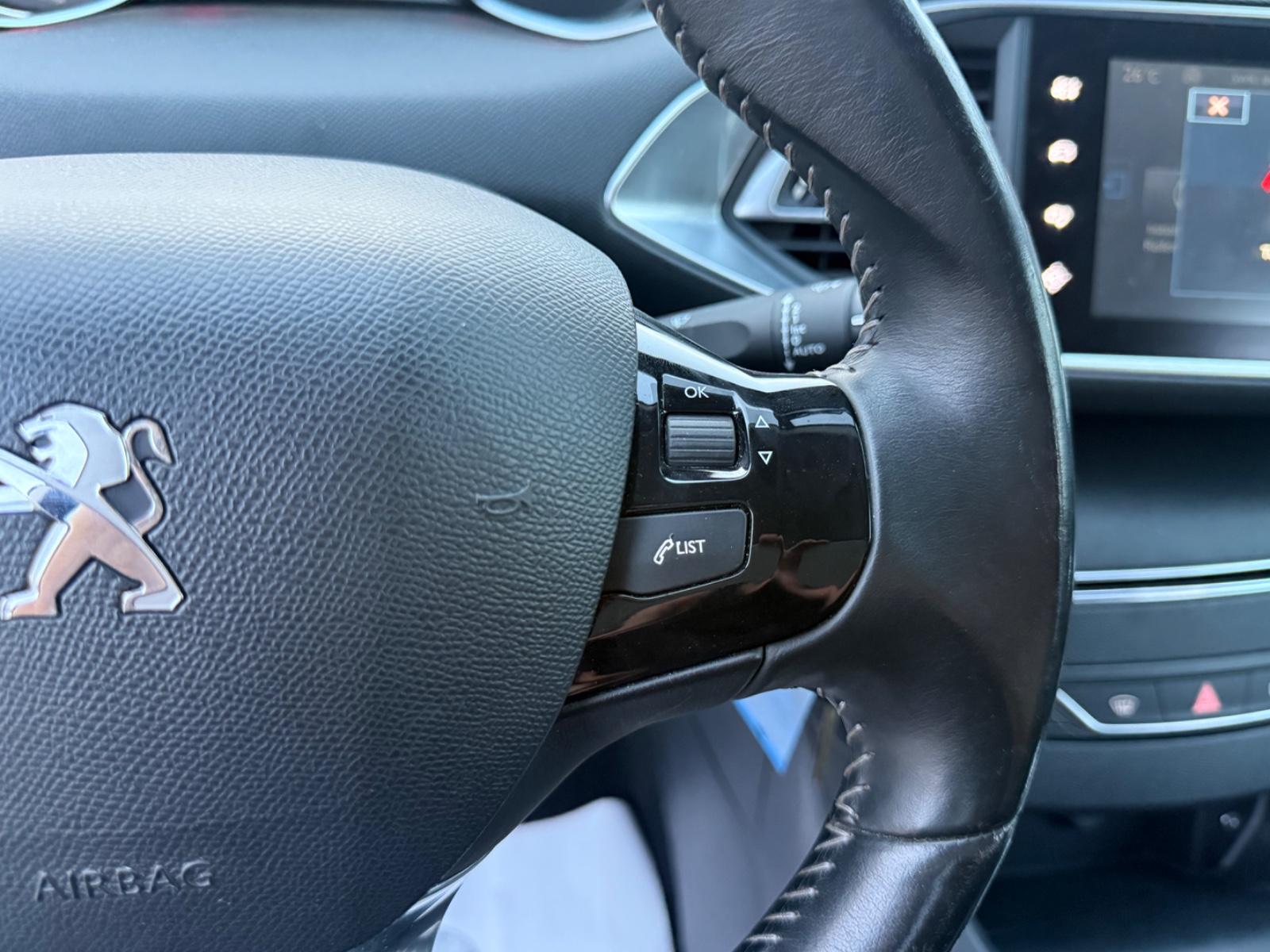 Peugeot 308 2014 — фото 19