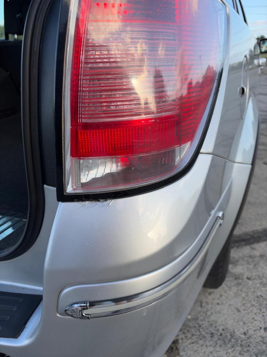 Opel Astra 2005 — photo 12