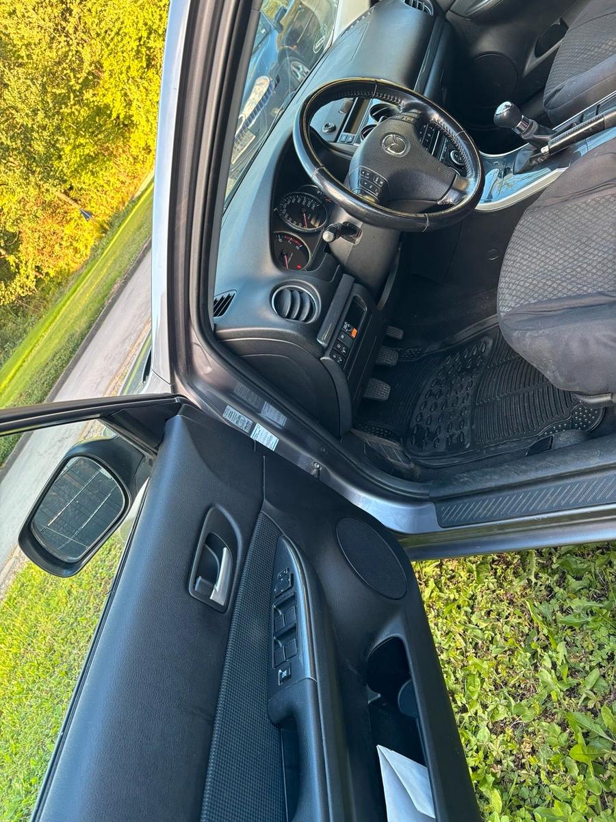 Mazda 2 2006 — photo 8