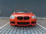 BMW F20 125i  M-Paket AHK Schalter - BMW: Orange