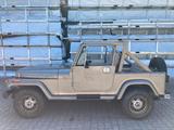 Jeep Wrangler 2.5 Oldtimer Sahara - Jeep Wrangler aus 1991