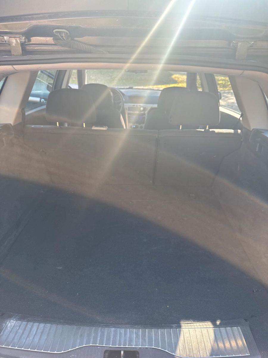 Opel Astra 2009 — photo 11