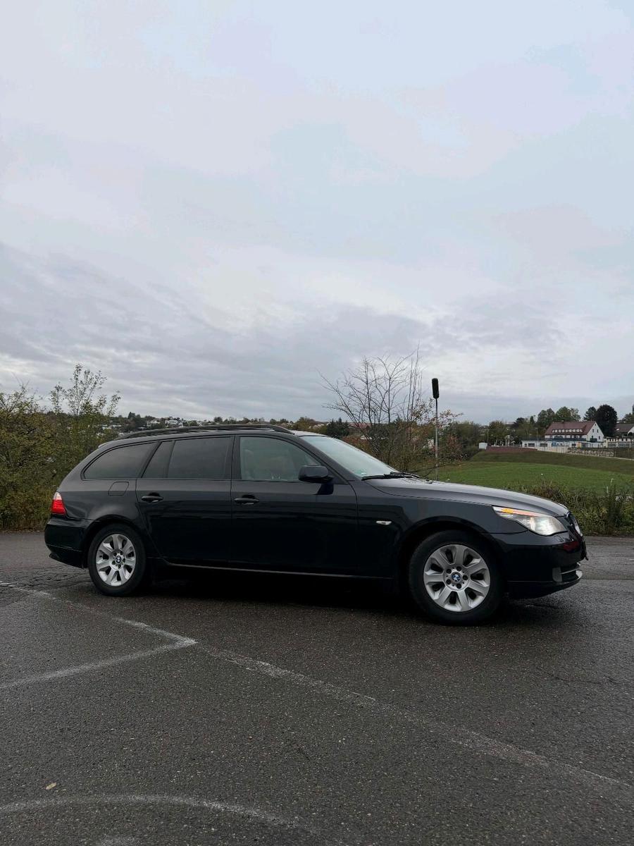 BMW 520 2008 — rear view