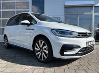 VW Touran 1.5 TSI DSG R-Line Ex 7SI KAM AHK 4J GAR bei Autohaus Landmann & Maier OHG