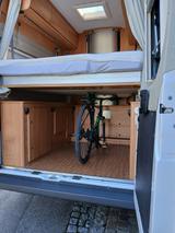 Pössl Roadcruiser Revolution mit elektrischem Hubbett - Kastenwagen Hubbett