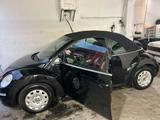 Volkswagen VW Beetle Schwarz/Vollleder rot - Volkswagen Beetle aus 2006: Cabrio