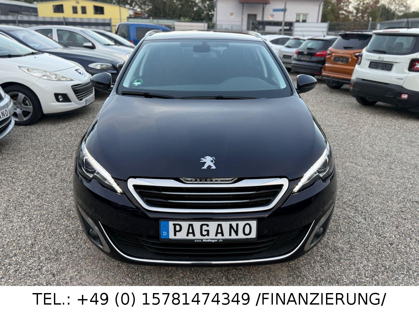 Peugeot 308 2014 — вигляд ззаду