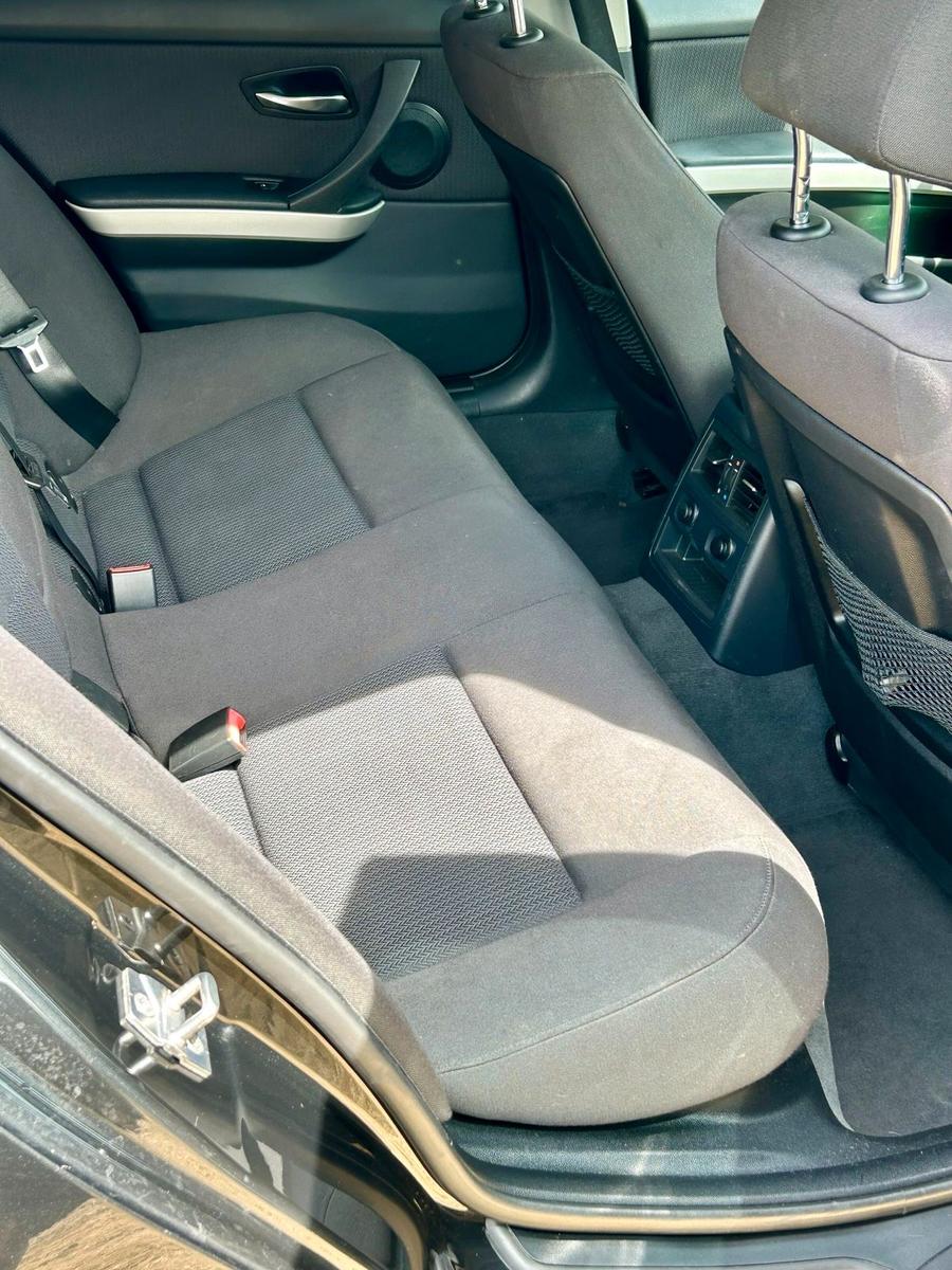 BMW 318 2009 — photo 14
