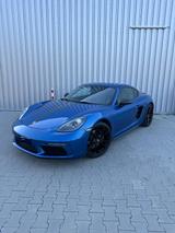 Porsche Cayman 718 + Porsche Approved/Sport AGA - blaue Porsche Cayman