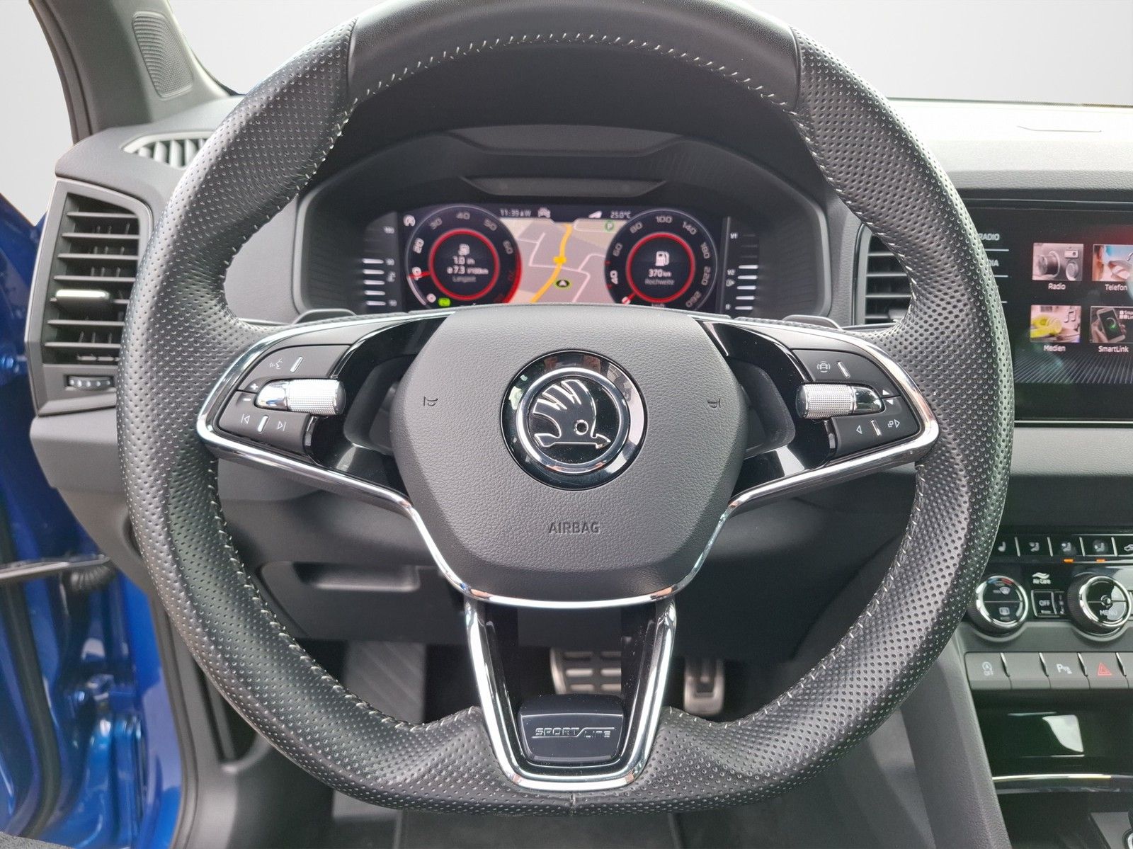 SKODA Karoq 1.5 TSI Sportline DSG / AHK / NAVI / KAMER - Image 11