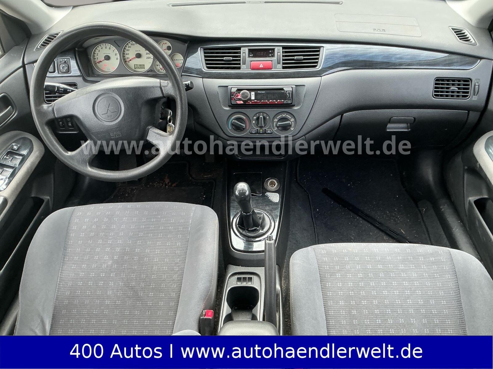 Mitsubishi Lancer 2005 — photo 11