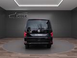 Volkswagen T6.1 Caravelle Comfortline *AHK *8 Sitze *LED *r - Volkswagen Gebrauchtwagen in Augsburg
