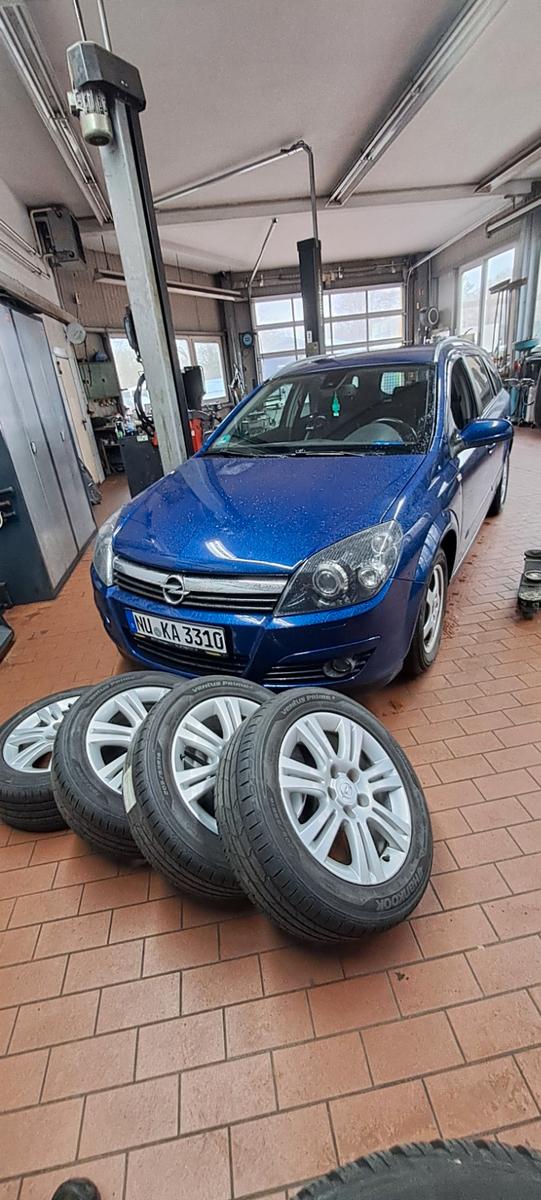 Opel Astra 2005 — photo 11