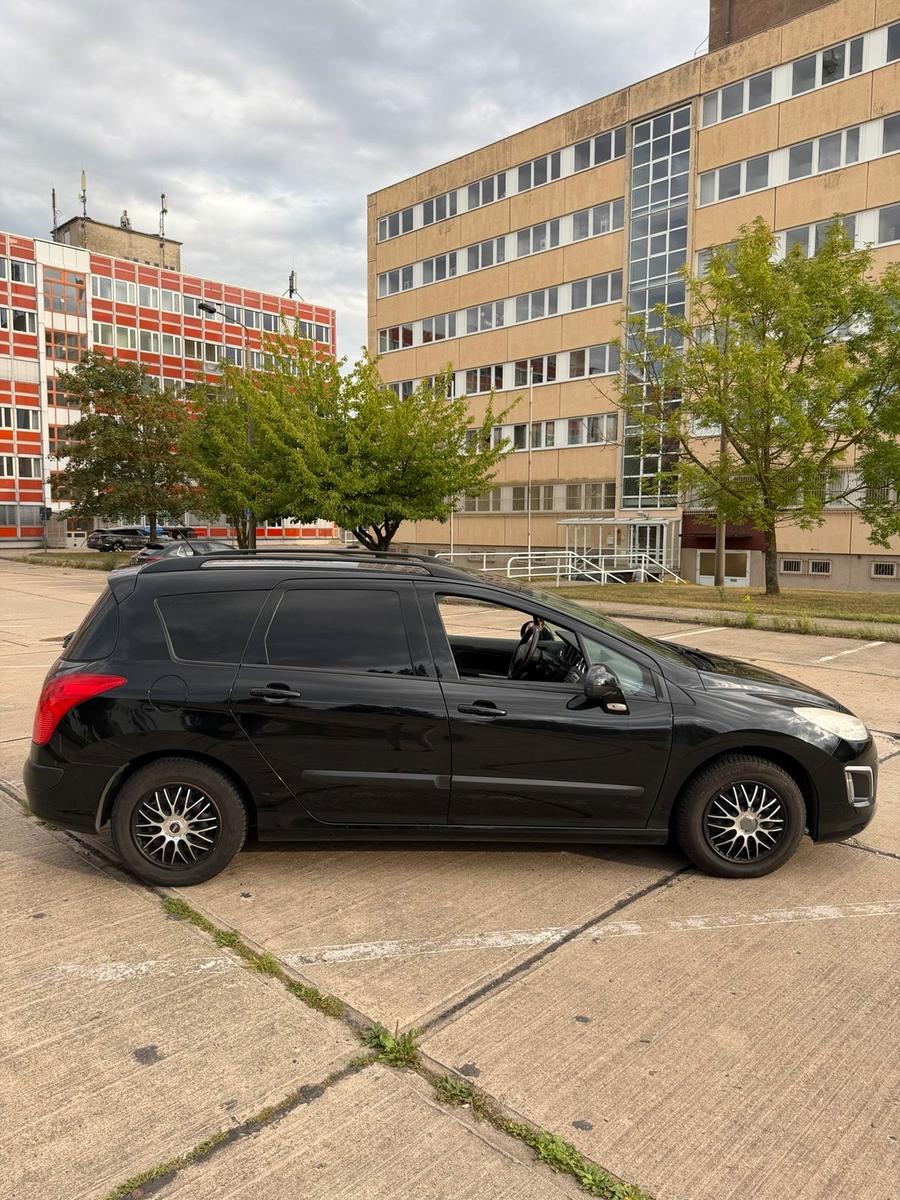 Peugeot 308 2012 — photo 7