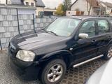 Mazda Tribute 2,3 - Mazda Tribute