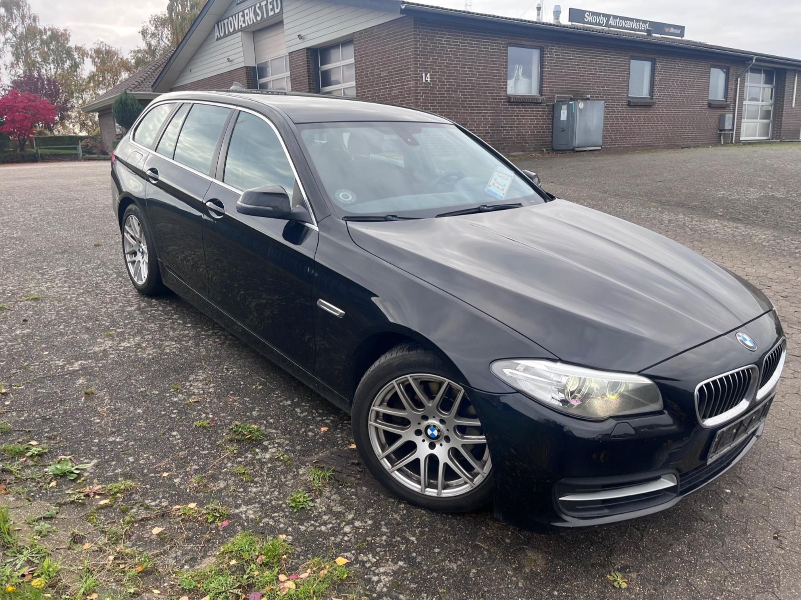 BMW 520 2013 — rear view
