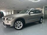 BMW X1 18 i sDrive - BMW X1 aus 2012 mit Benzin-Antrieb: Geländewagen