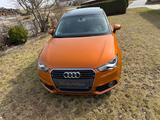 Audi A1 1.4 TFSI Attraction Sportback Attraction - Audi A1: Orange