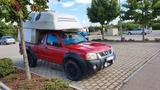 Nissan Pick-up mit Absetzkabine / Wohnkabi... - Nissan PickUp Gebrauchtwagen
