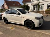 BMW X4 M40i - weiße BMW X4 M40