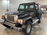 Jeep Wrangler 2.4 Sport "MwSt.,AHK,Navi,4X4" - Jeep Gebrauchtwagen in Hannover