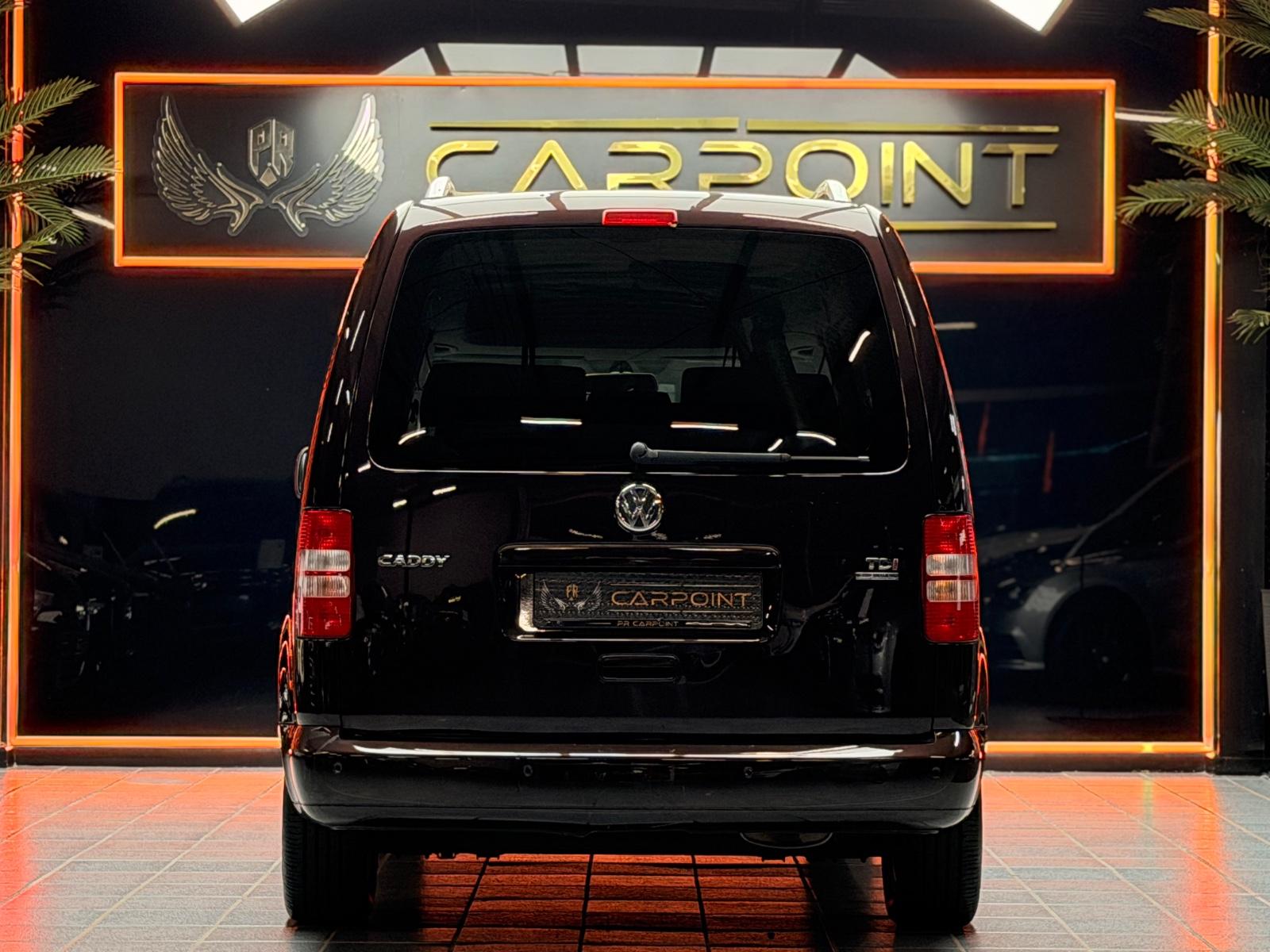 Volkswagen Caddy Maxi Kombi / Navi /7-Sitzer/Rollstuhl-Kran